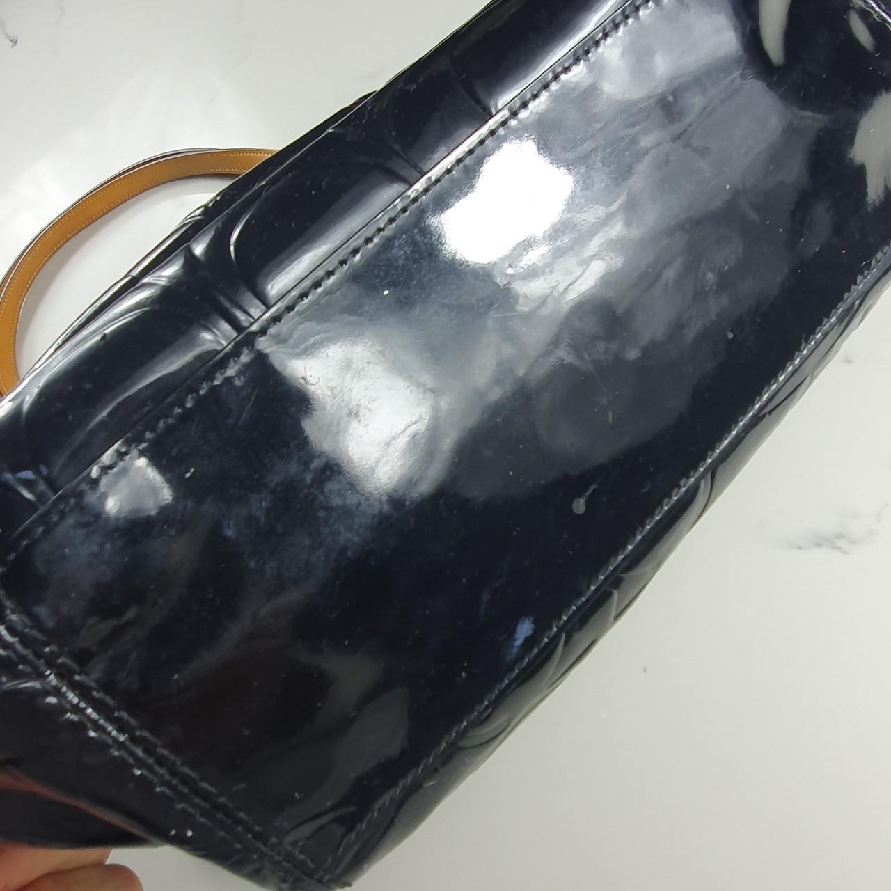 Authentic Coach black patent leather handbag with gold hardware