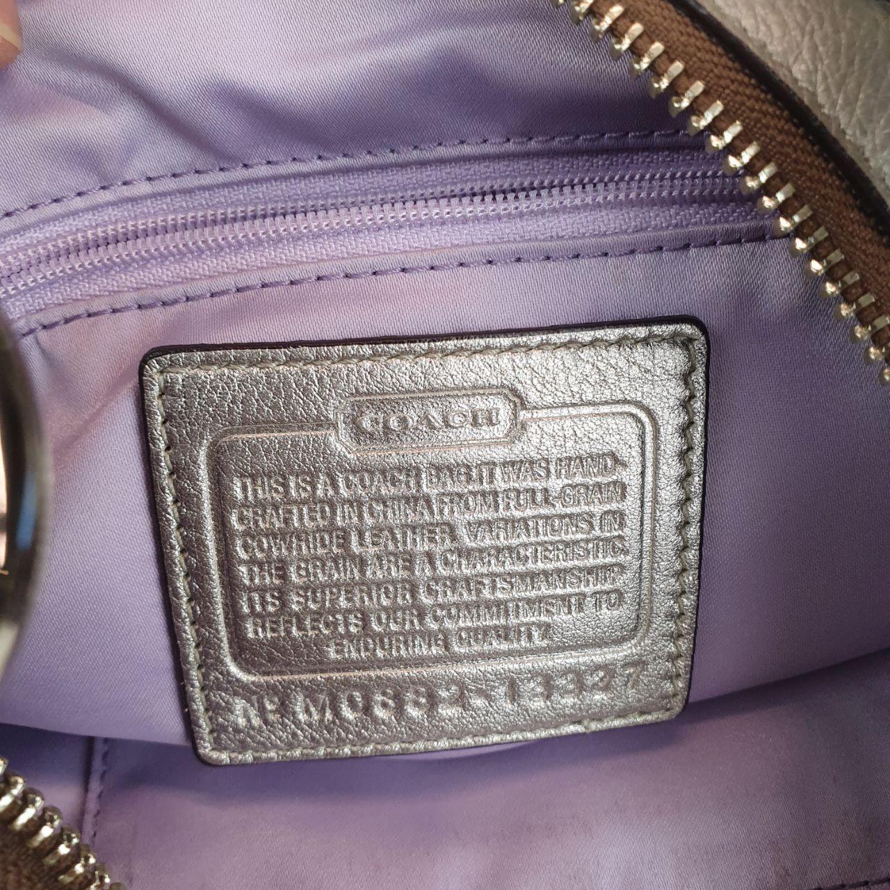 Authentic Coach Penelope  hobo purse in metallic silver champagne