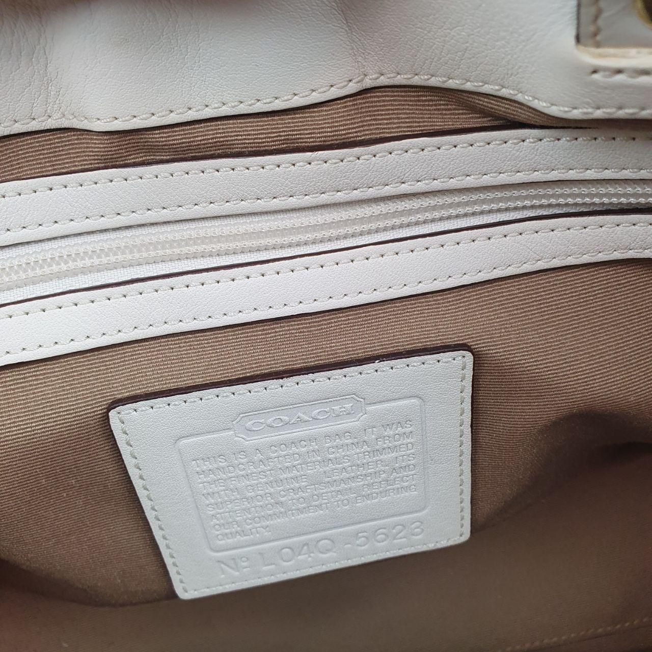 Coach Signature Canvas and White Leather Handbag with Gold Buckle
