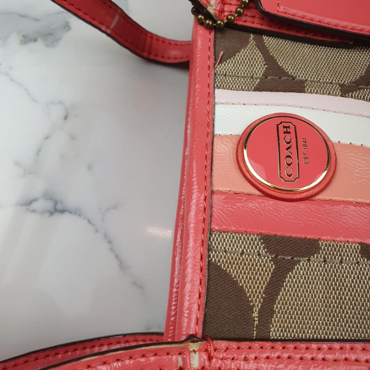 Coach Signature Canvas and Leather Tote Bag with Coral Accents