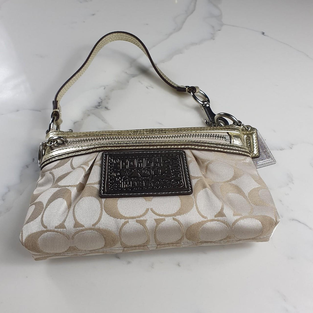 Authentic Coach signature mini purse with silver hardware
