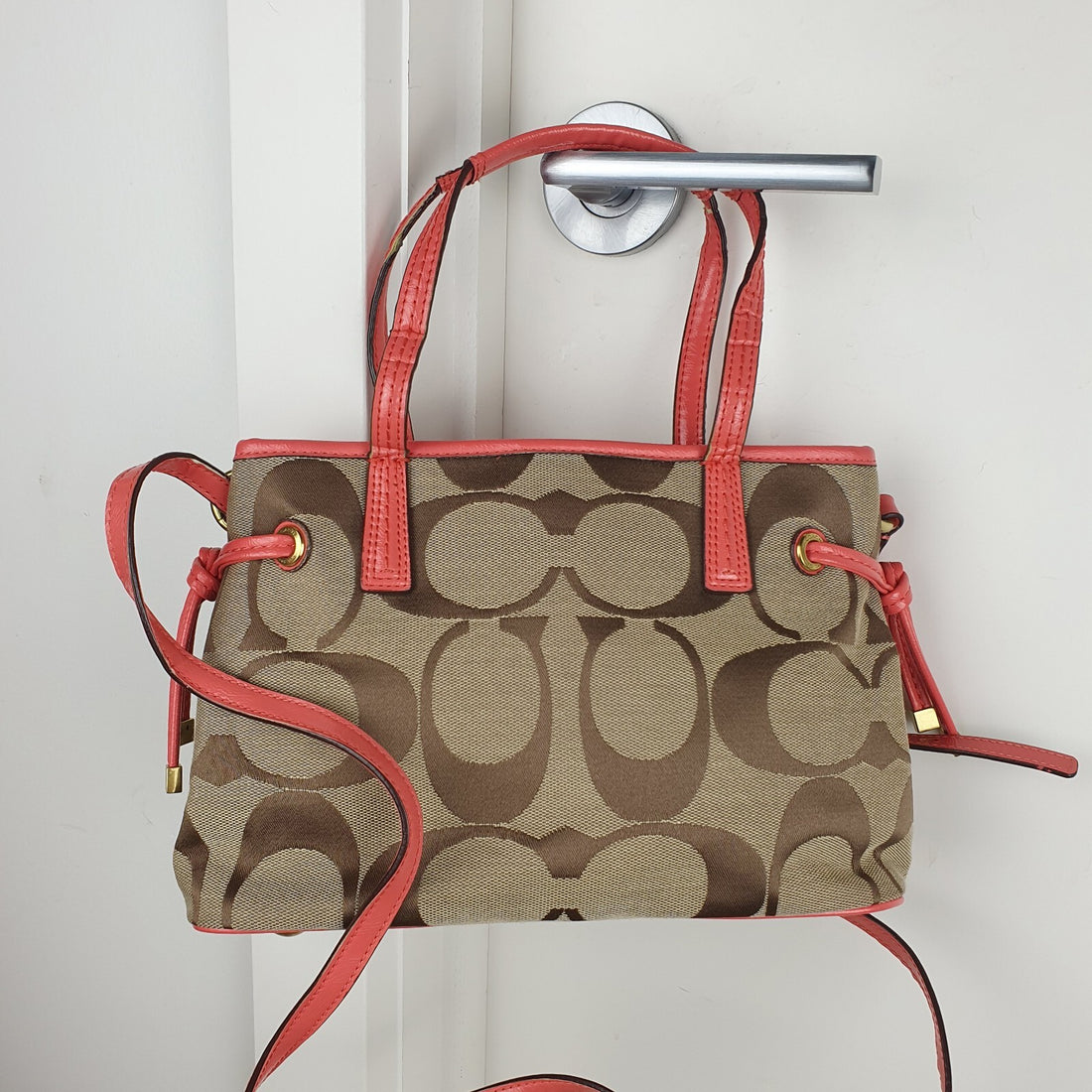 Coach Signature Canvas and Leather Tote Bag with Coral Accents