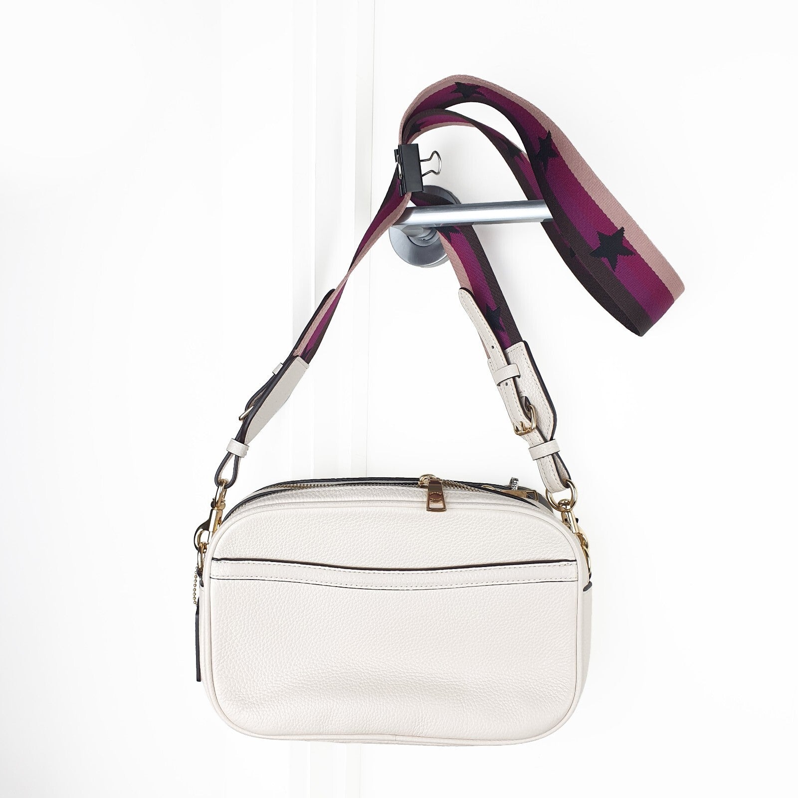 Authentic brand new Coach white leather crossbody bag with purple star strap