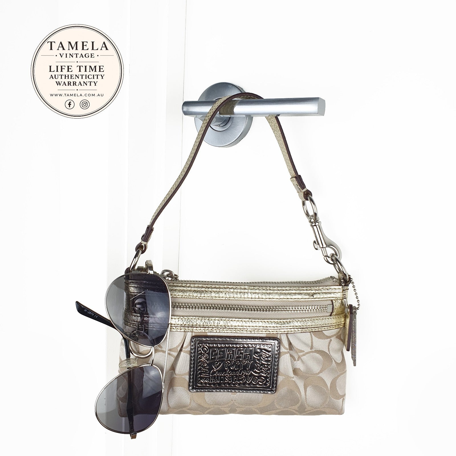 Authentic Coach signature mini purse with silver hardware