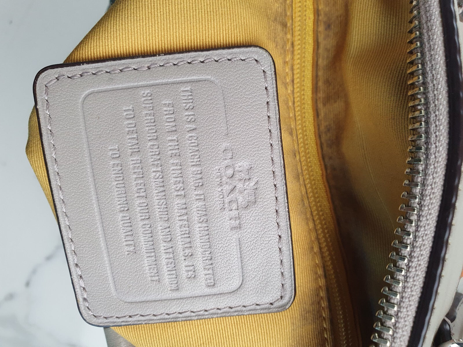 Coach Vintage White Leather Handbag with Orange and Yellow Stripe Detail