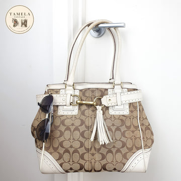 Coach Signature Canvas and Leather Tote Bag with Tassel Detail