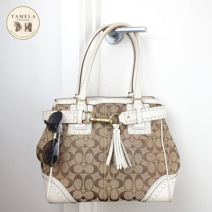 Coach Signature Canvas and Leather Tote Bag with Tassel Detail