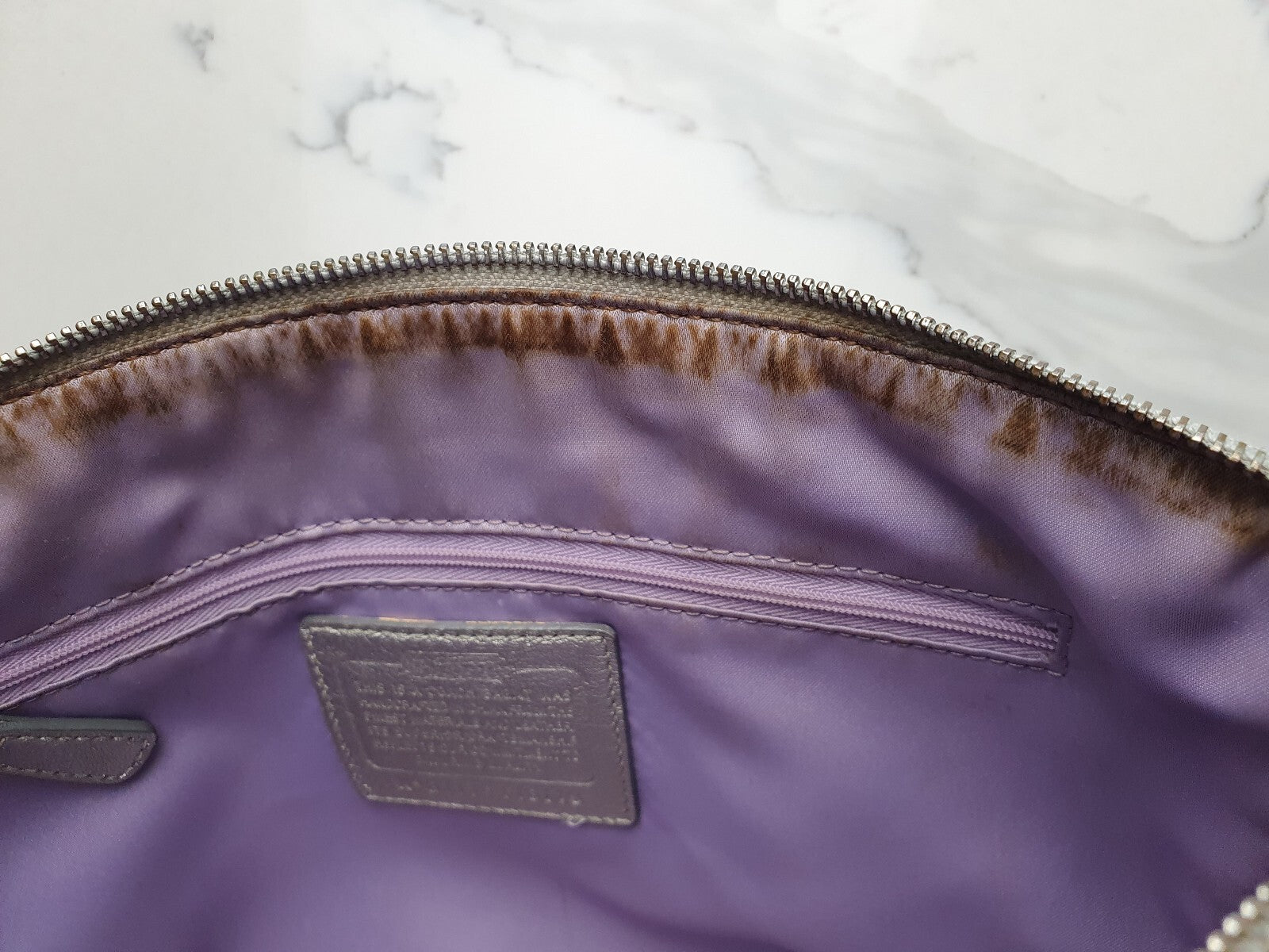 Coach Signature Canvas Handbag with Metallic Leather Trim