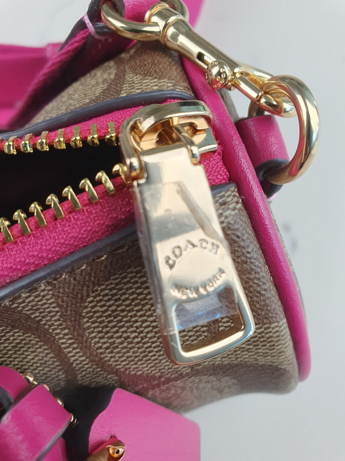 Coach Signature Canvas and Pink Leather Barrel Bag with Tassel