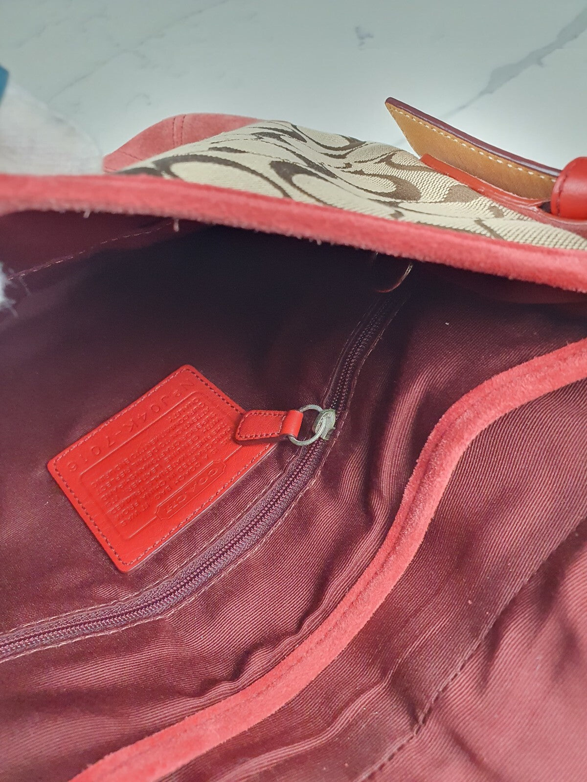 Coach Signature Canvas and Leather Shoulder Bag in Brown and Coral