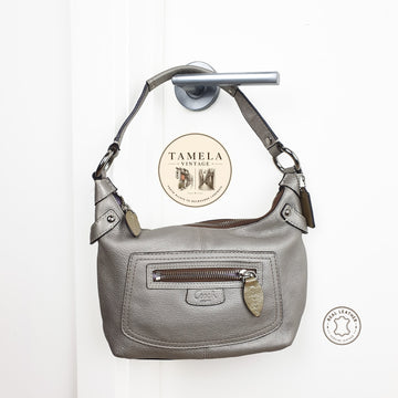 Authentic Coach Penelope  hobo purse in metallic silver champagne