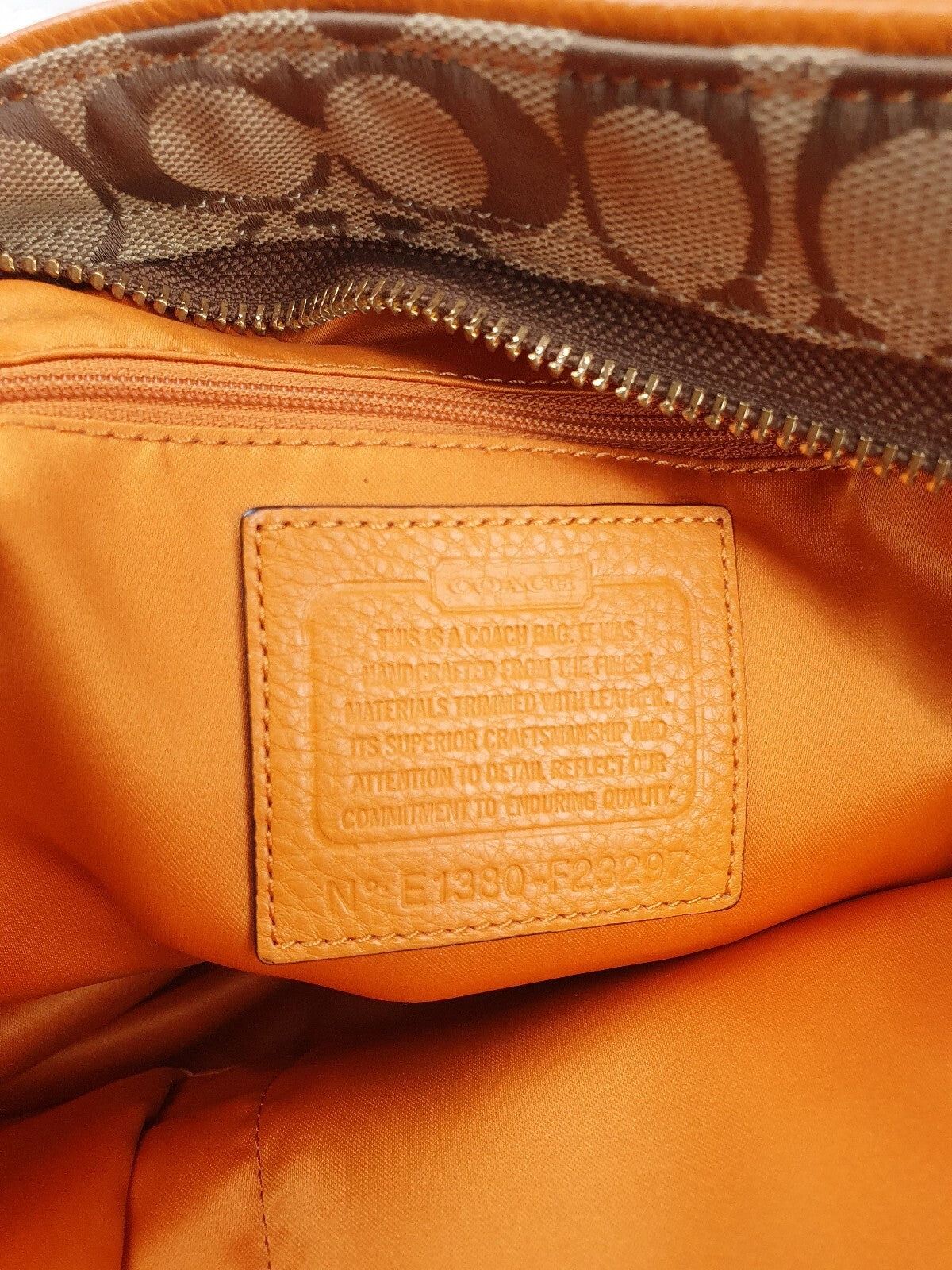 Coach Signature Canvas and Genuine Leather Tote Bag in Tan and Orange