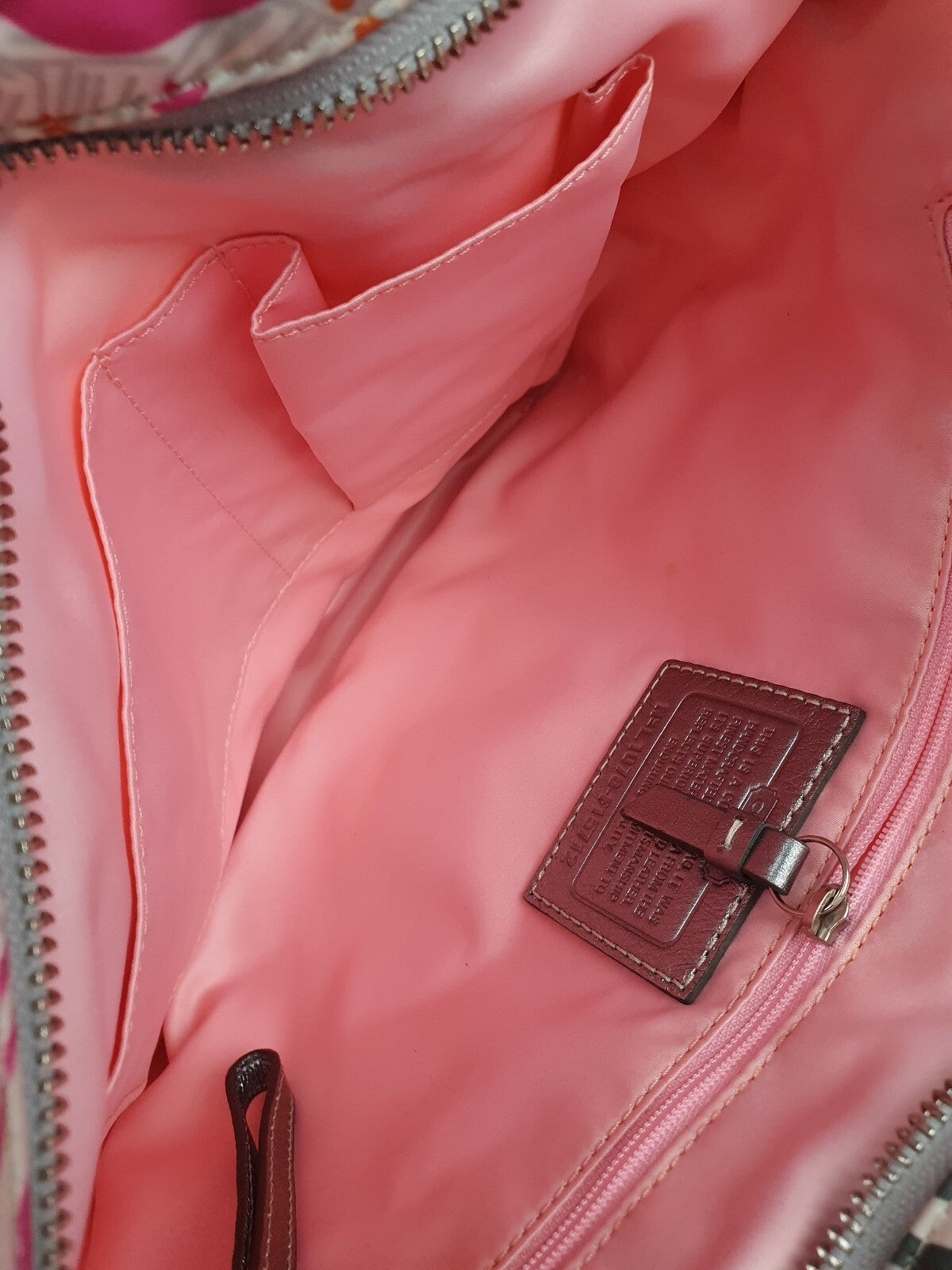 Coach Handbag with Colorful Butterfly and Logo Print