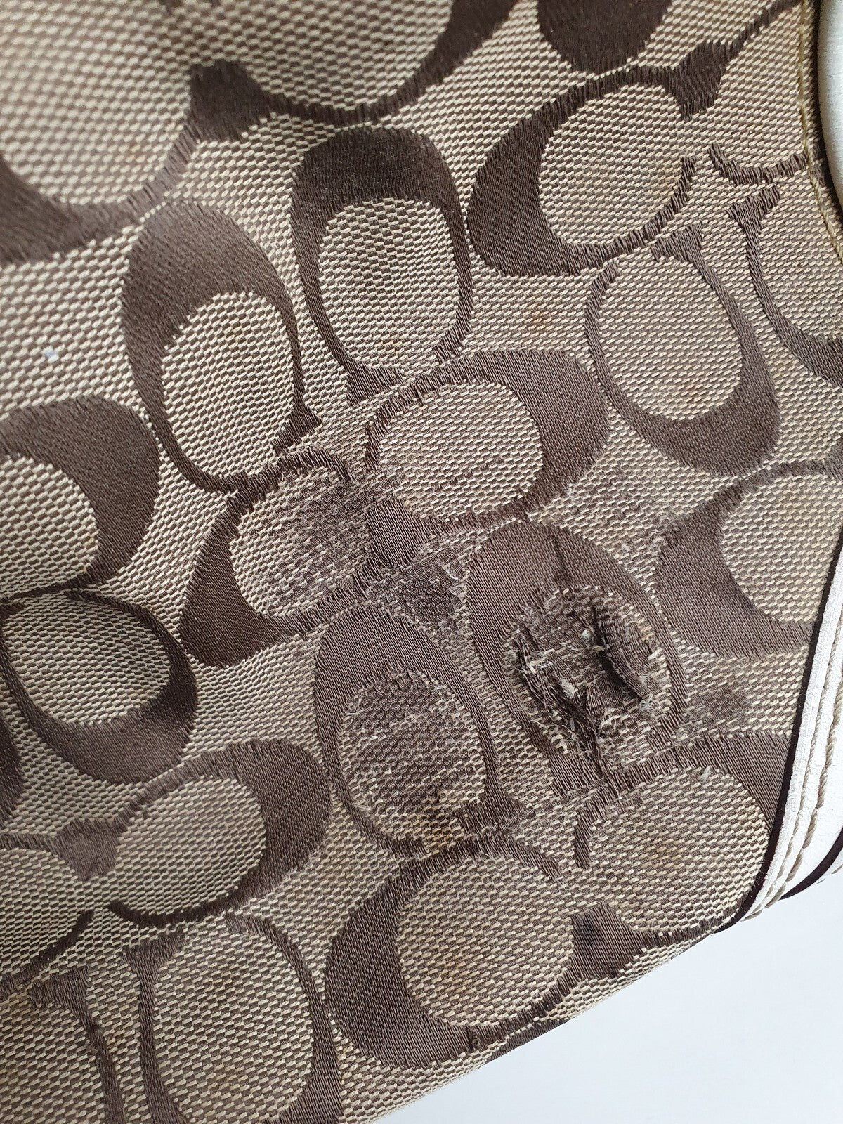 Coach Signature Canvas and Leather Tote Bag with Tassel Detail