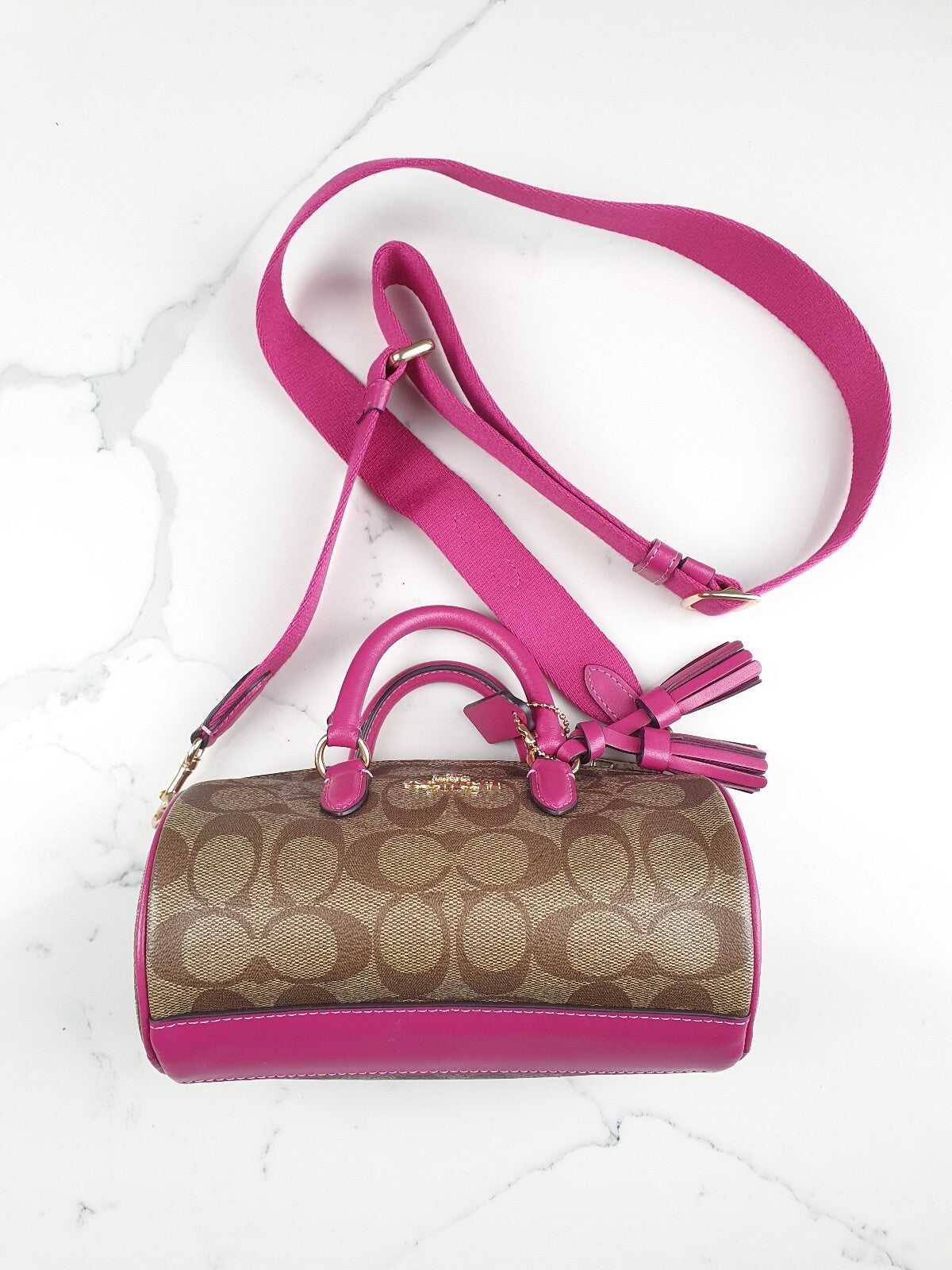 Coach Signature Canvas and Pink Leather Barrel Bag with Tassel