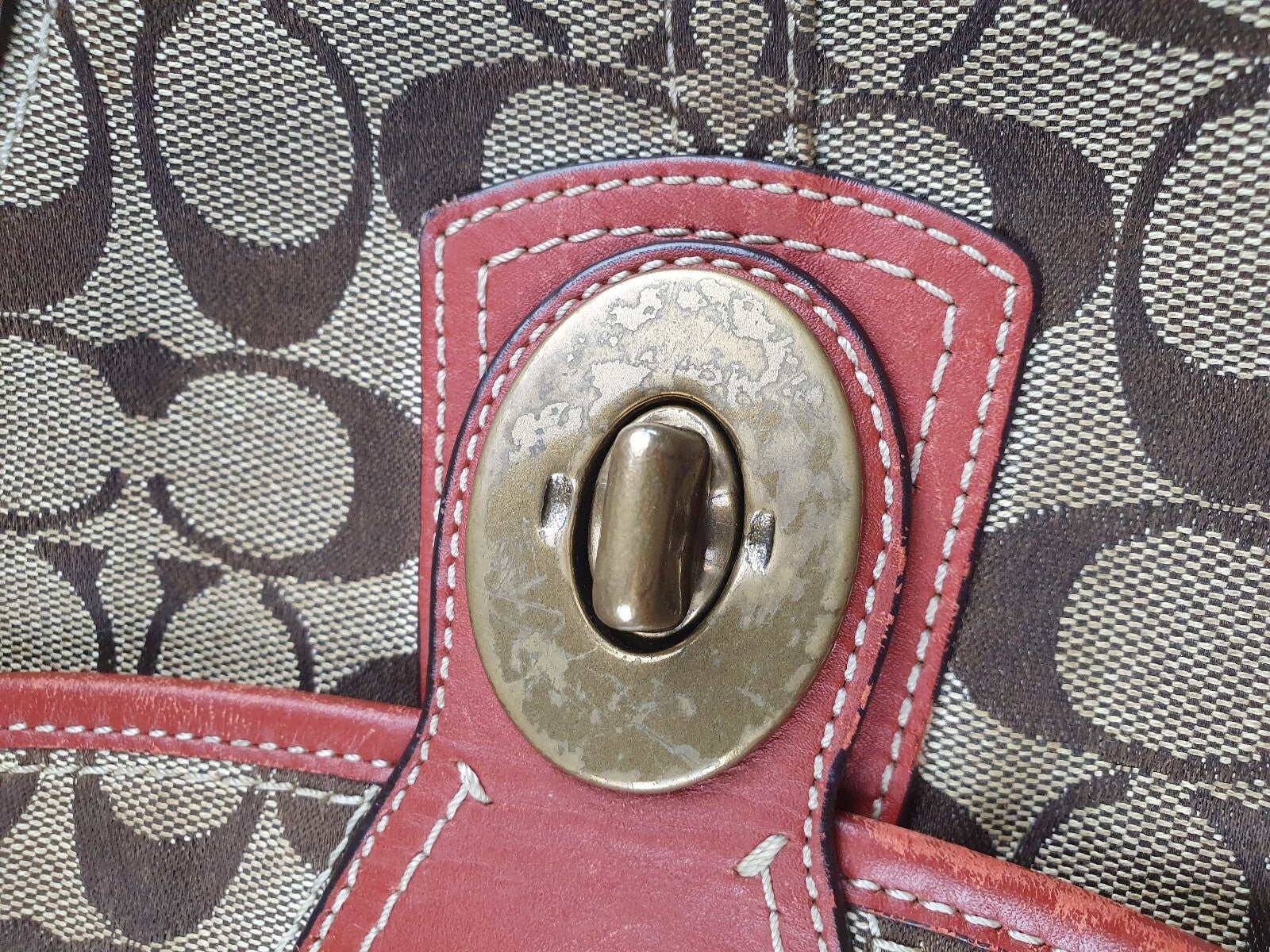 Coach Signature Canvas and Leather Shoulder Bag with Turnlock Closure