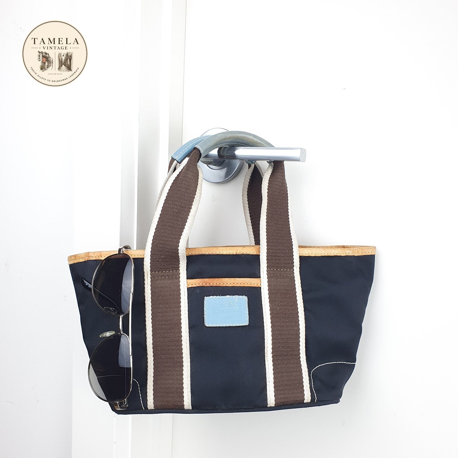 Coach Mini Black Tote Bag with Brown and Cream handles