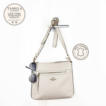 Coach Pebbled Leather Crossbody Bag in Light Beige