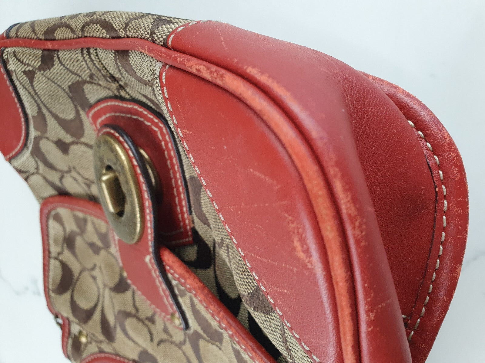 Coach Signature Canvas and Leather Shoulder Bag with Turnlock Closure