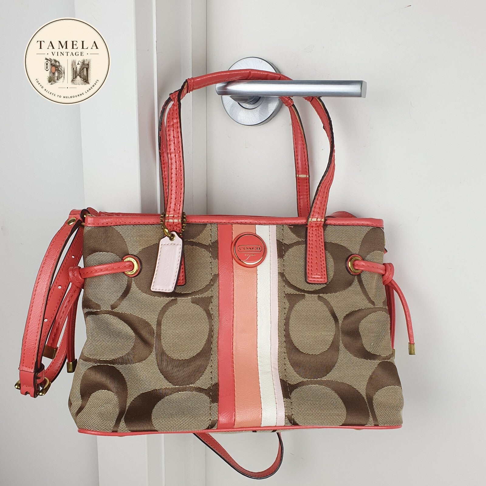 Coach Signature Canvas and Leather Tote Bag with Coral Accents
