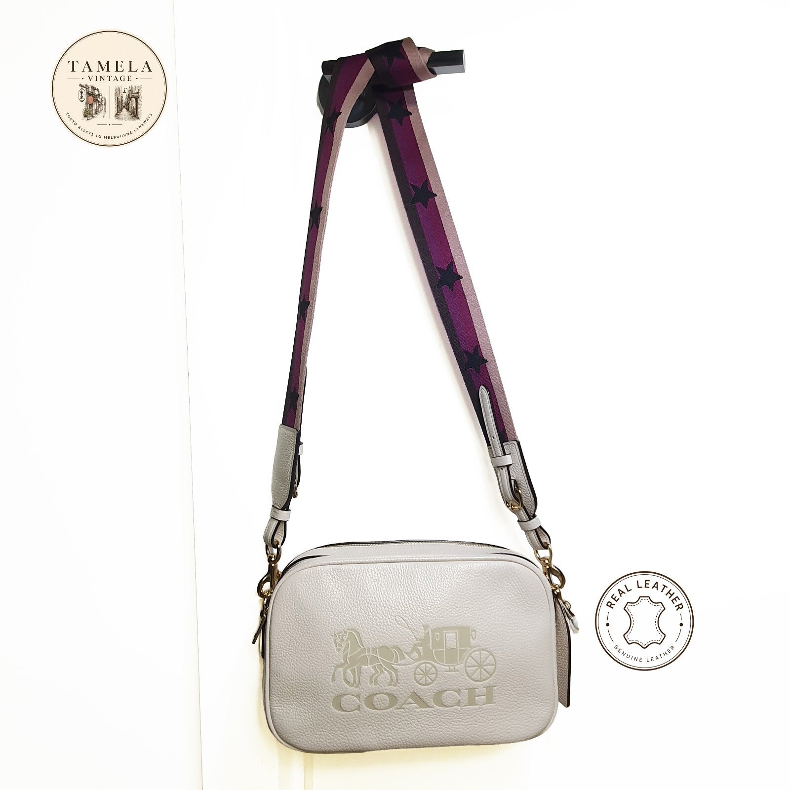 Authentic brand new Coach white leather crossbody bag with purple star strap