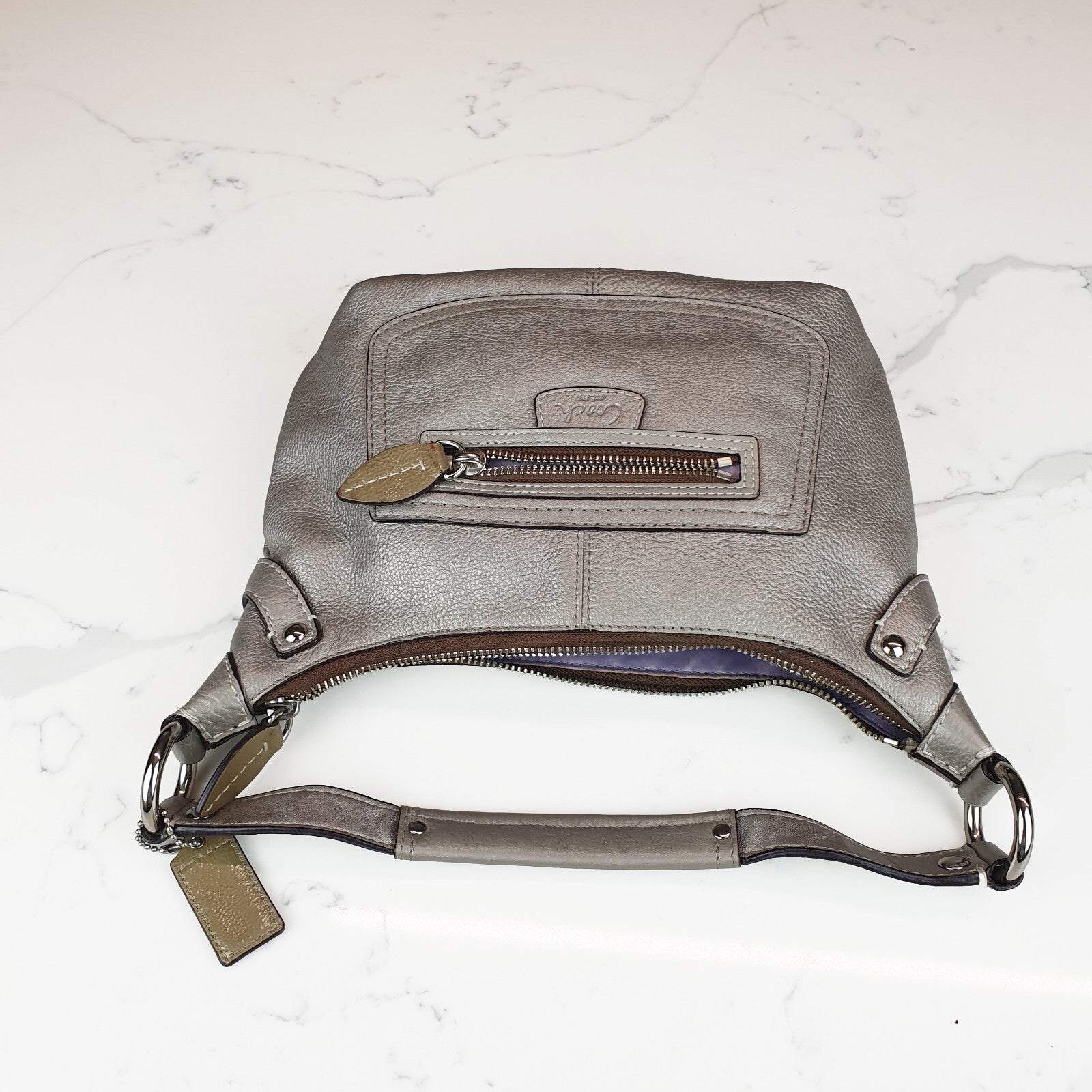 Authentic Coach Penelope  hobo purse in metallic silver champagne