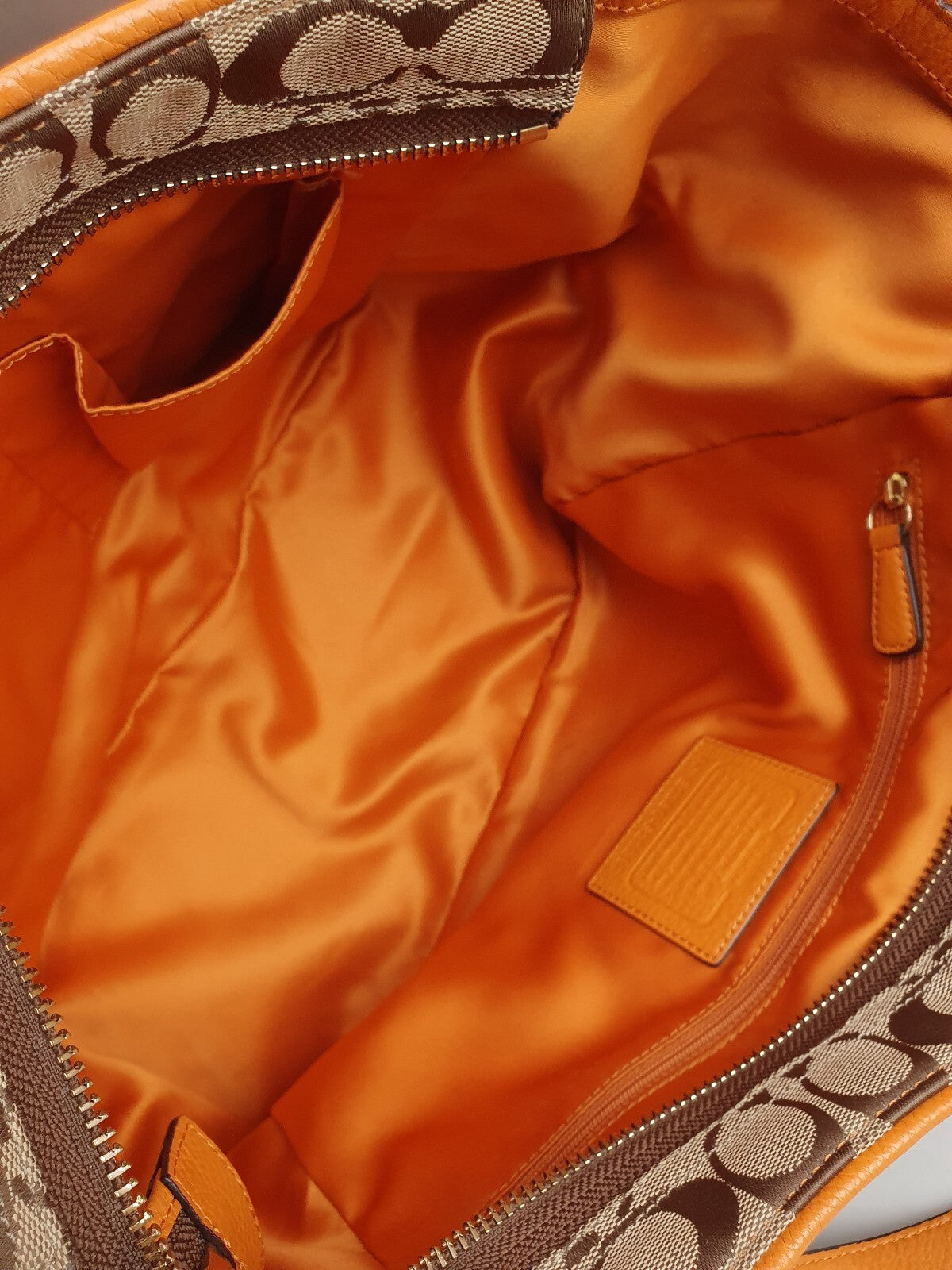 Coach Signature Canvas and Genuine Leather Tote Bag in Tan and Orange