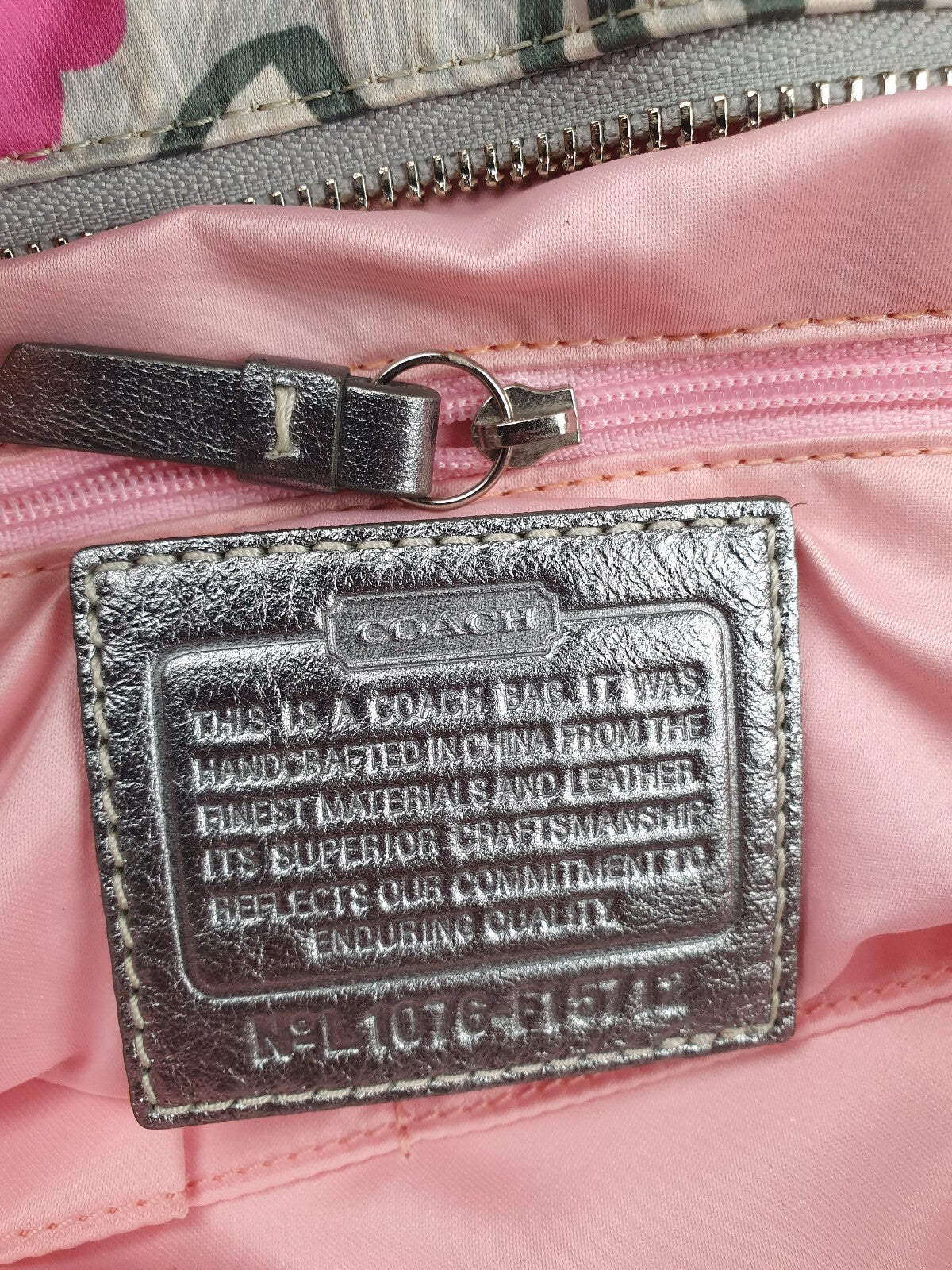 Coach Handbag with Colorful Butterfly and Logo Print