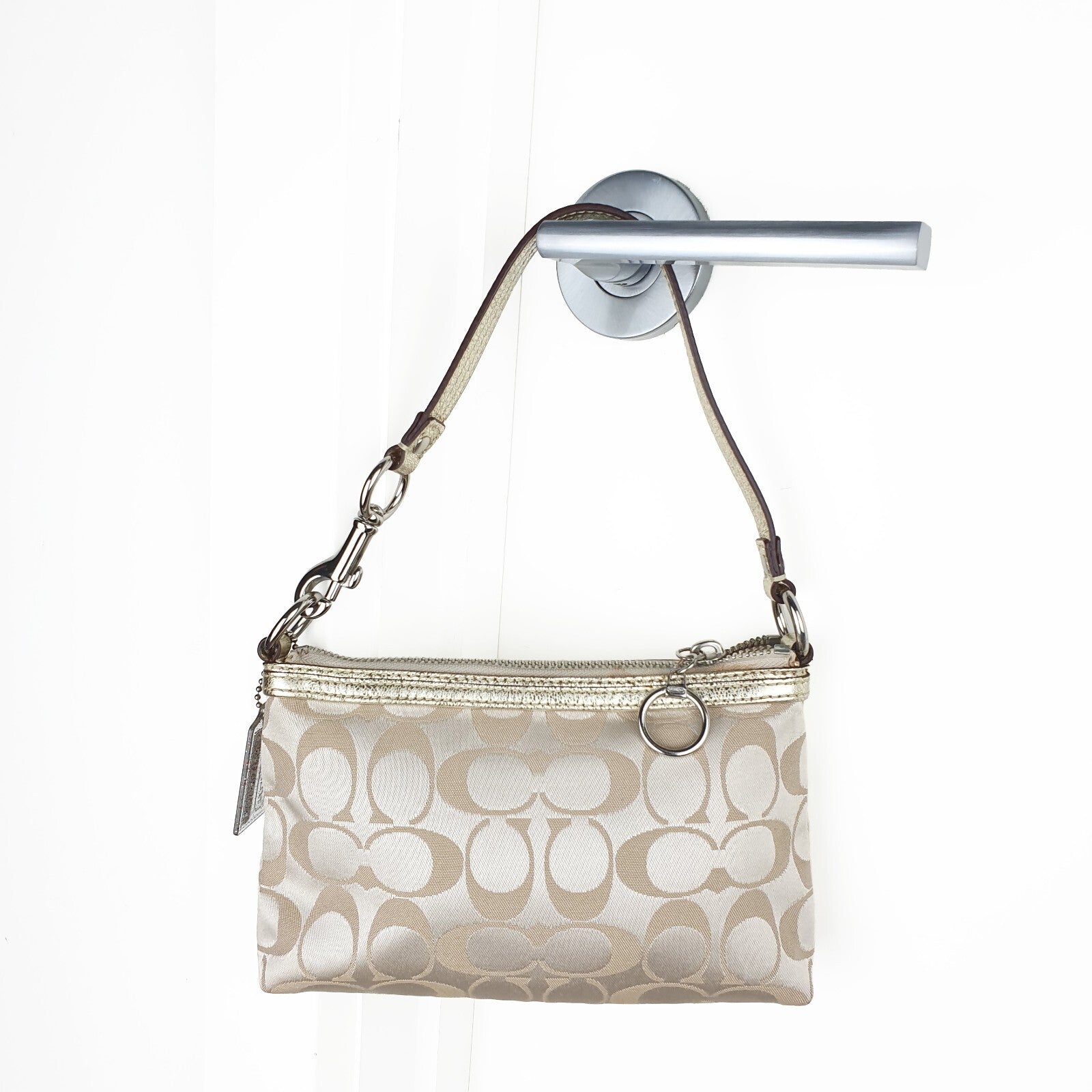 Authentic Coach signature mini purse with silver hardware