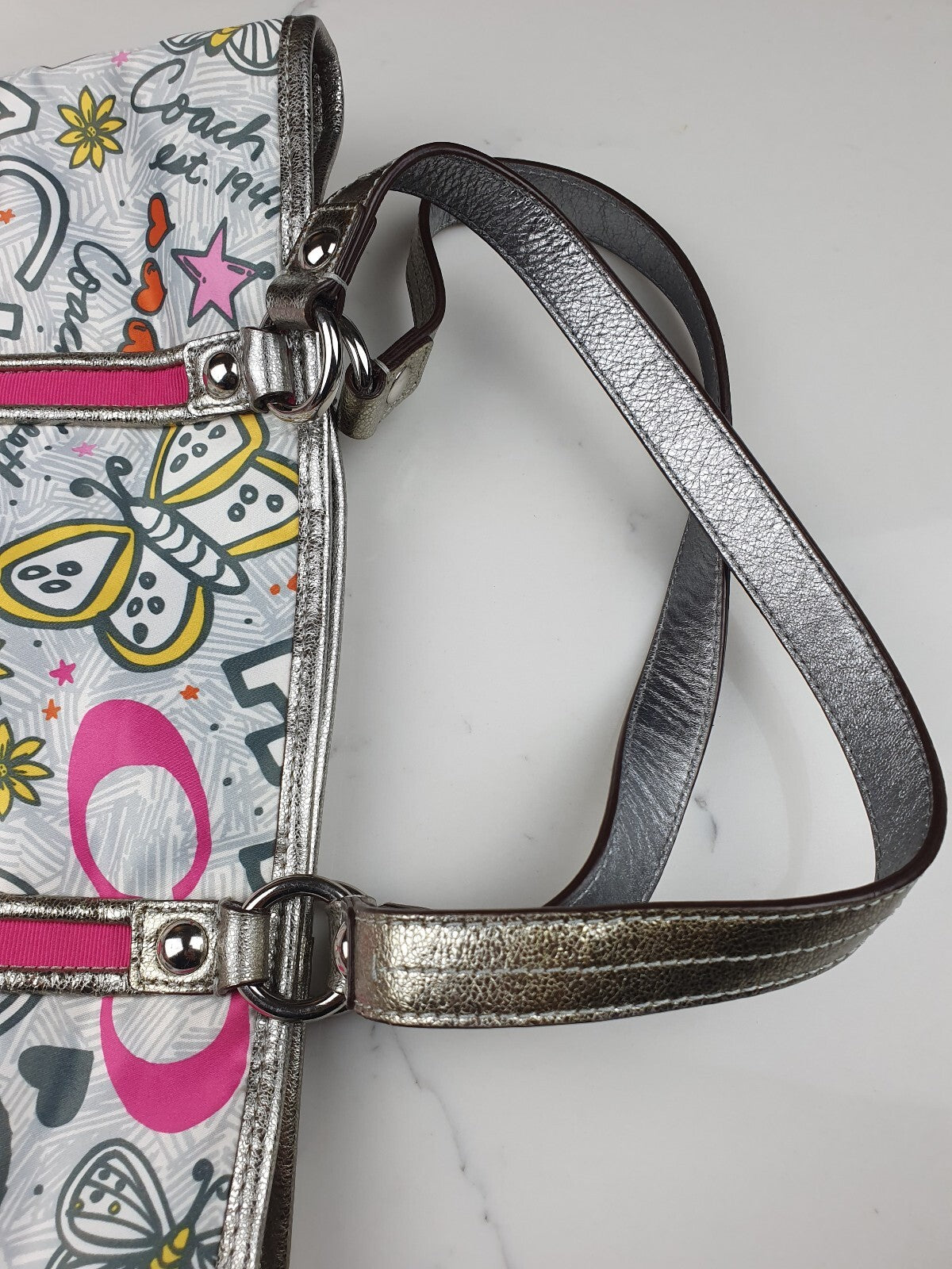 Coach Handbag with Colorful Butterfly and Logo Print