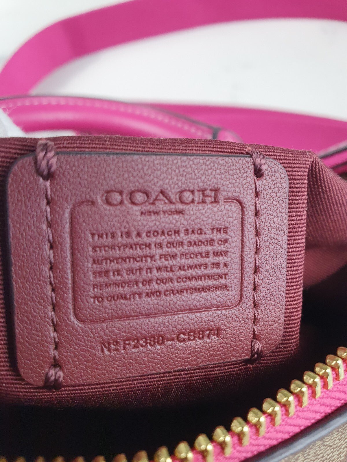 Coach Signature Canvas and Pink Leather Barrel Bag with Tassel