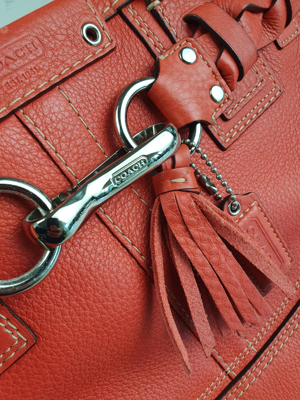 Coach Vintage Orange Leather Shoulder Bag with Braided Detail and Tassel