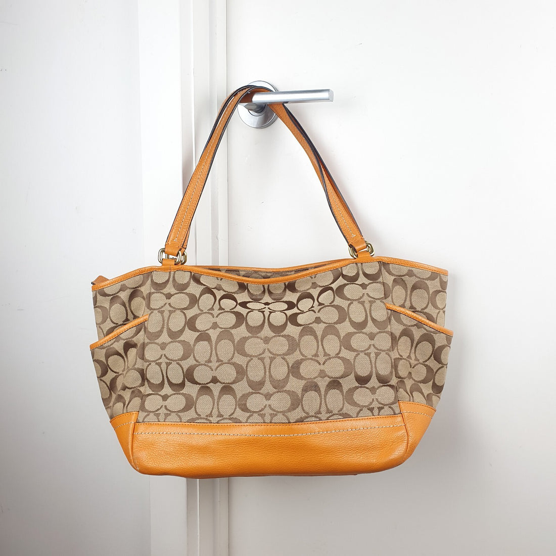 Coach Signature Canvas and Genuine Leather Tote Bag in Tan and Orange