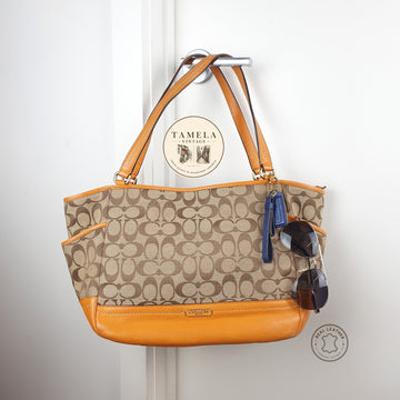 Coach Signature Canvas and Genuine Leather Tote Bag in Tan and Orange