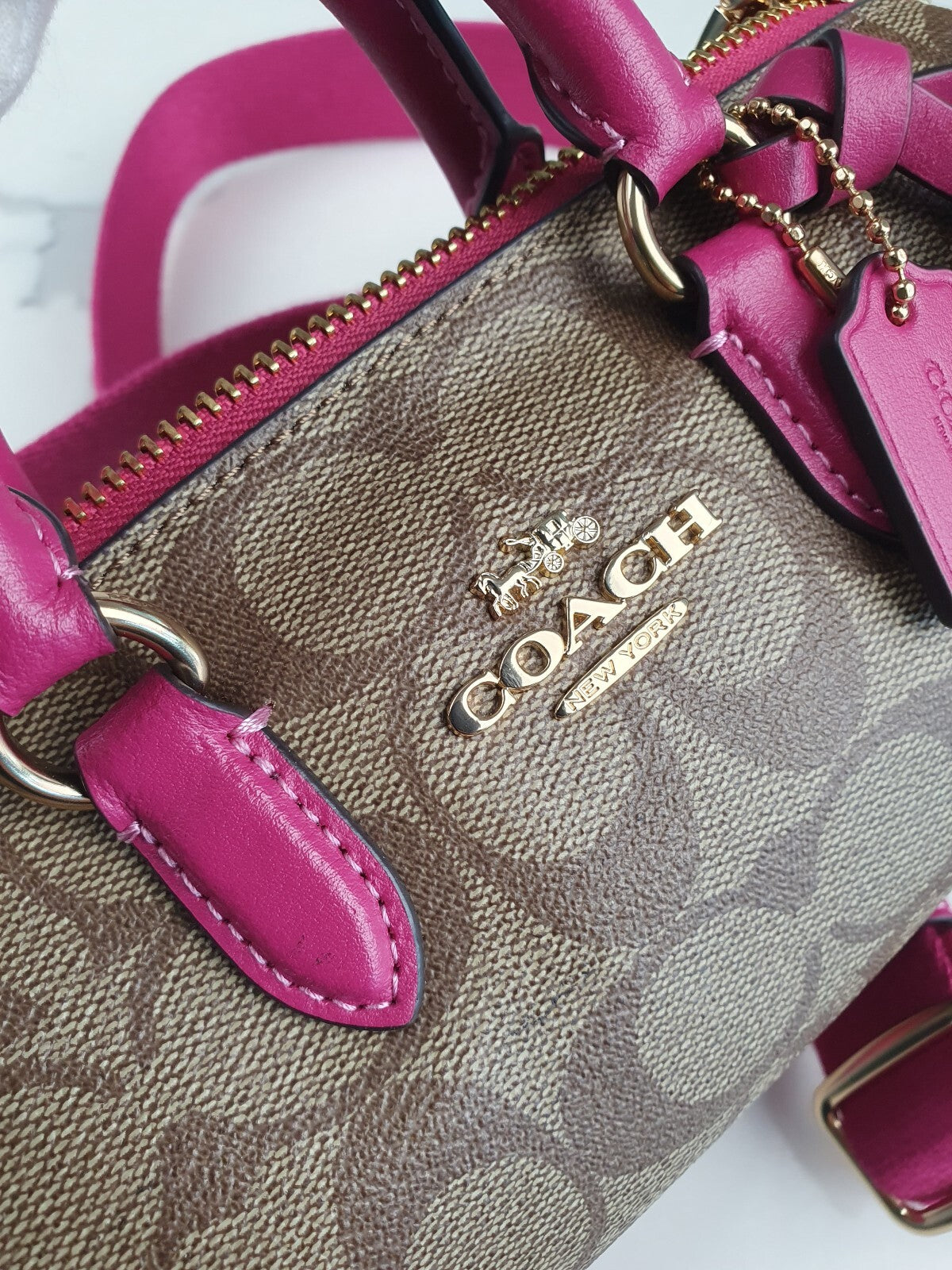 Coach Signature Canvas and Pink Leather Barrel Bag with Tassel