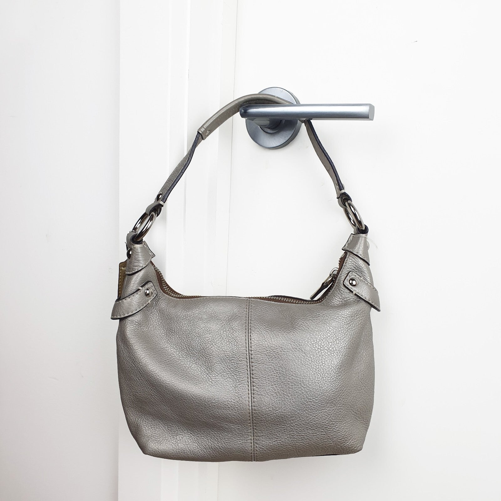 Authentic Coach Penelope  hobo purse in metallic silver champagne