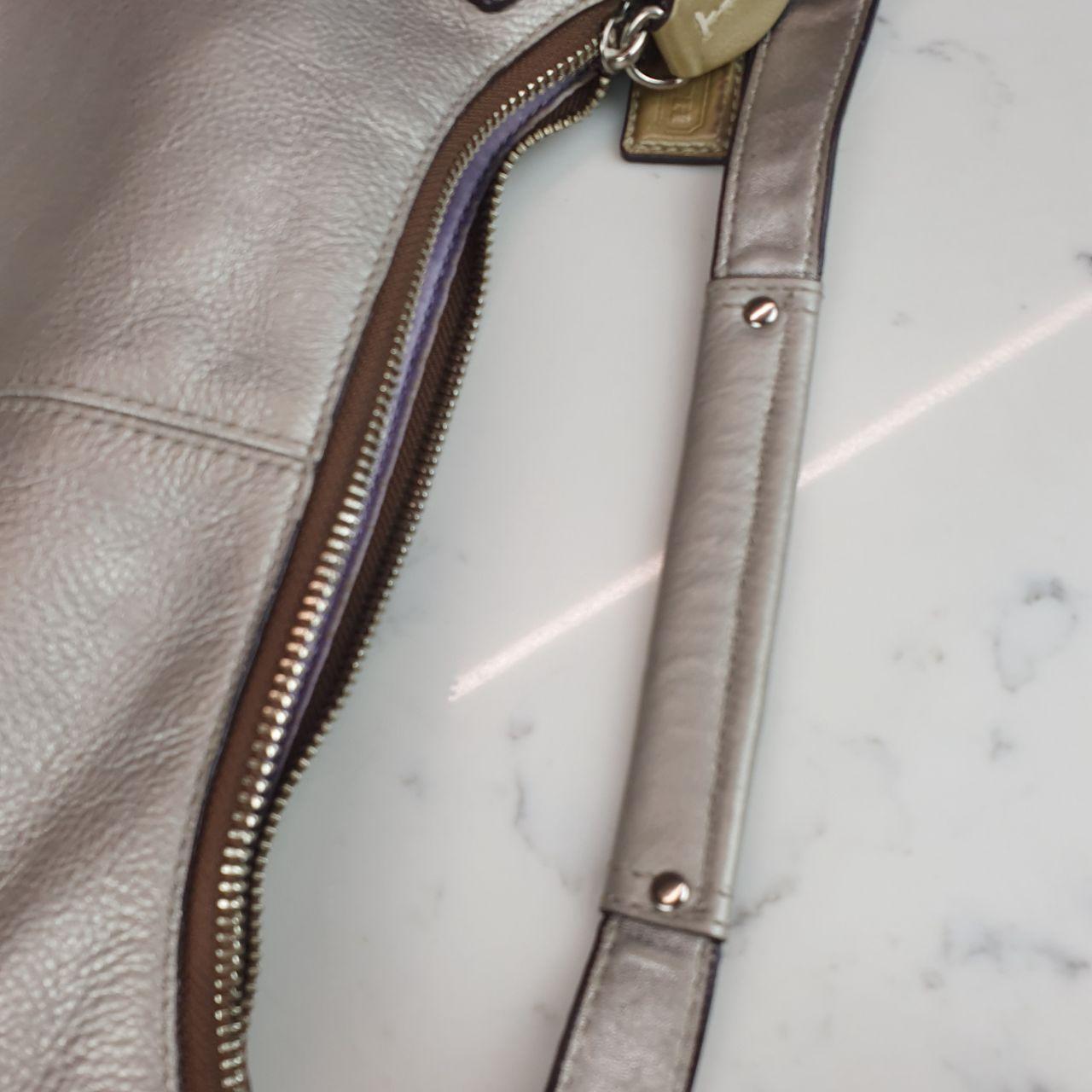 Authentic Coach Penelope  hobo purse in metallic silver champagne