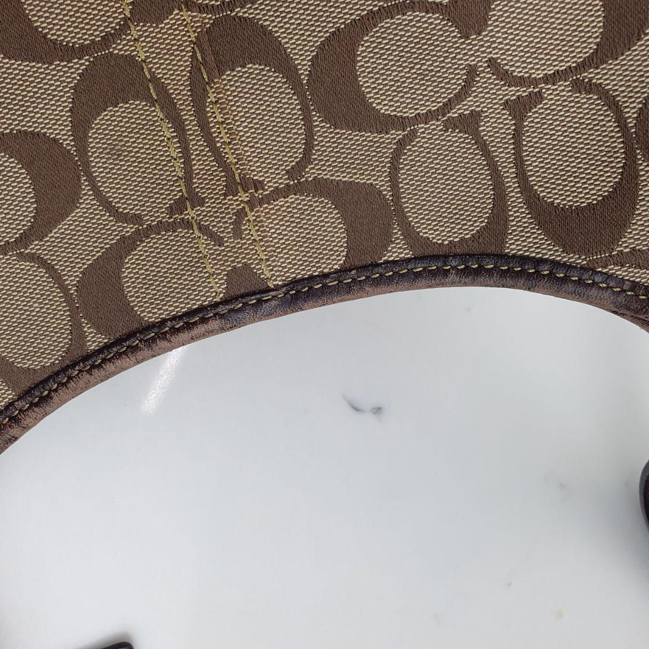Coach Signature Canvas Shoulder Bag in Brown