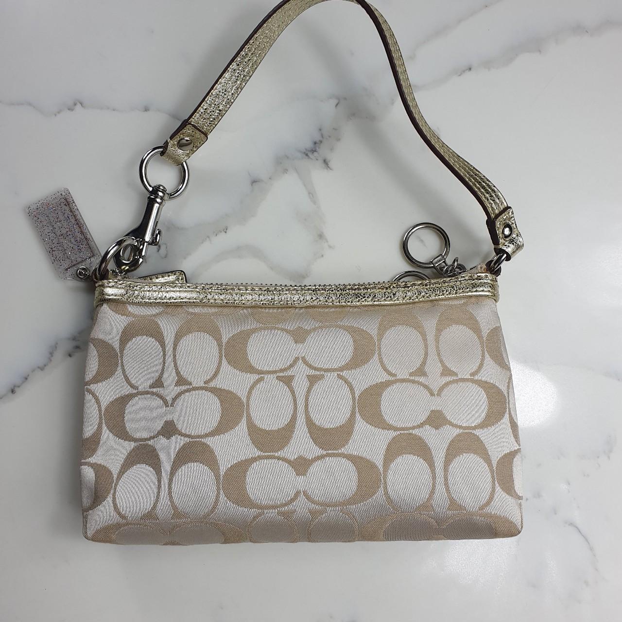 Authentic Coach signature mini purse with silver hardware